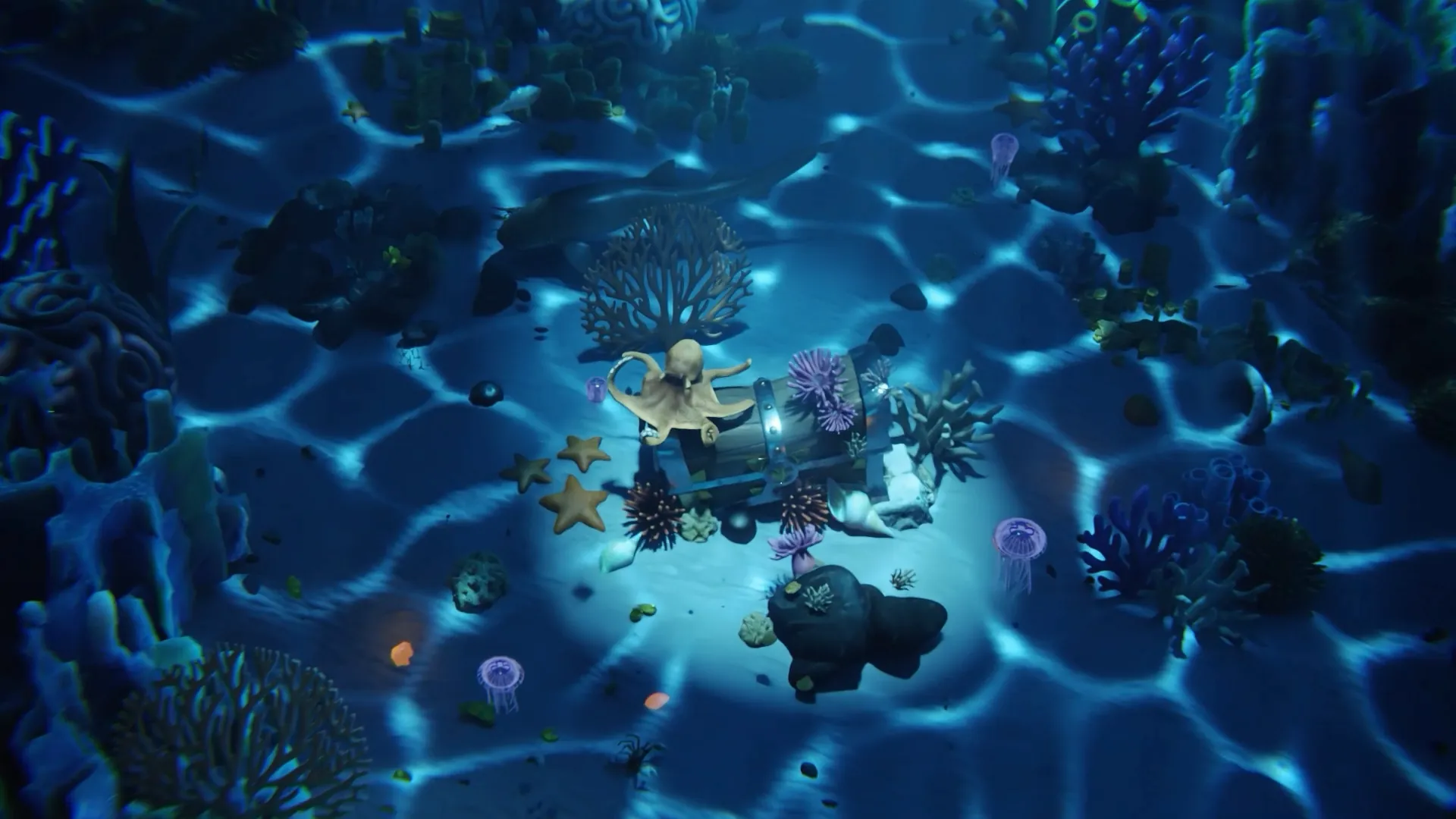 The chest on the sea floor, lit from above among coral and jellyfish